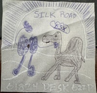 a drawing of a camel on a piece of cloth