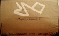 a brown paper bag with writing on it